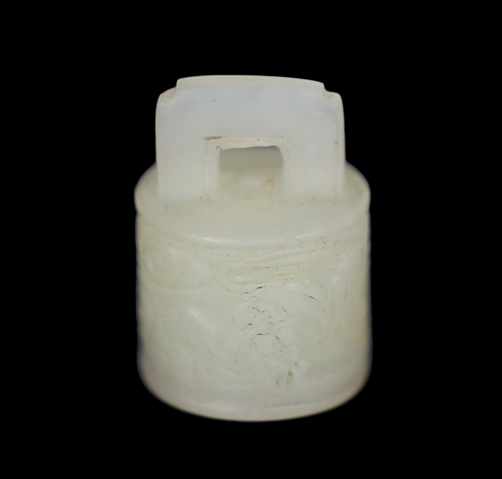 A Chinese miniature white jade seal of archaic bronze bell form, late Qing dynasty
